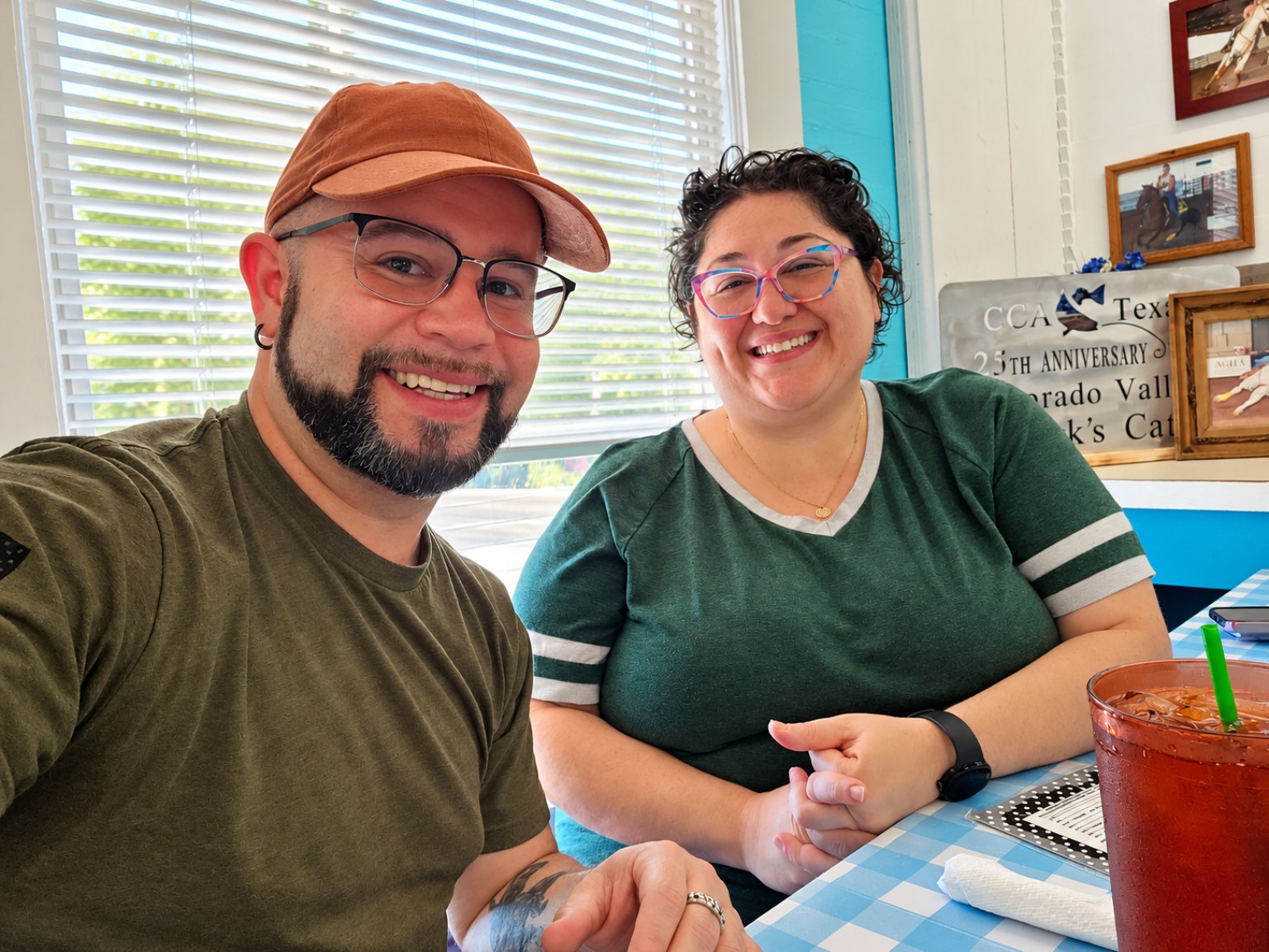 Efrain and Kelly seated together inside Orsak’s Café