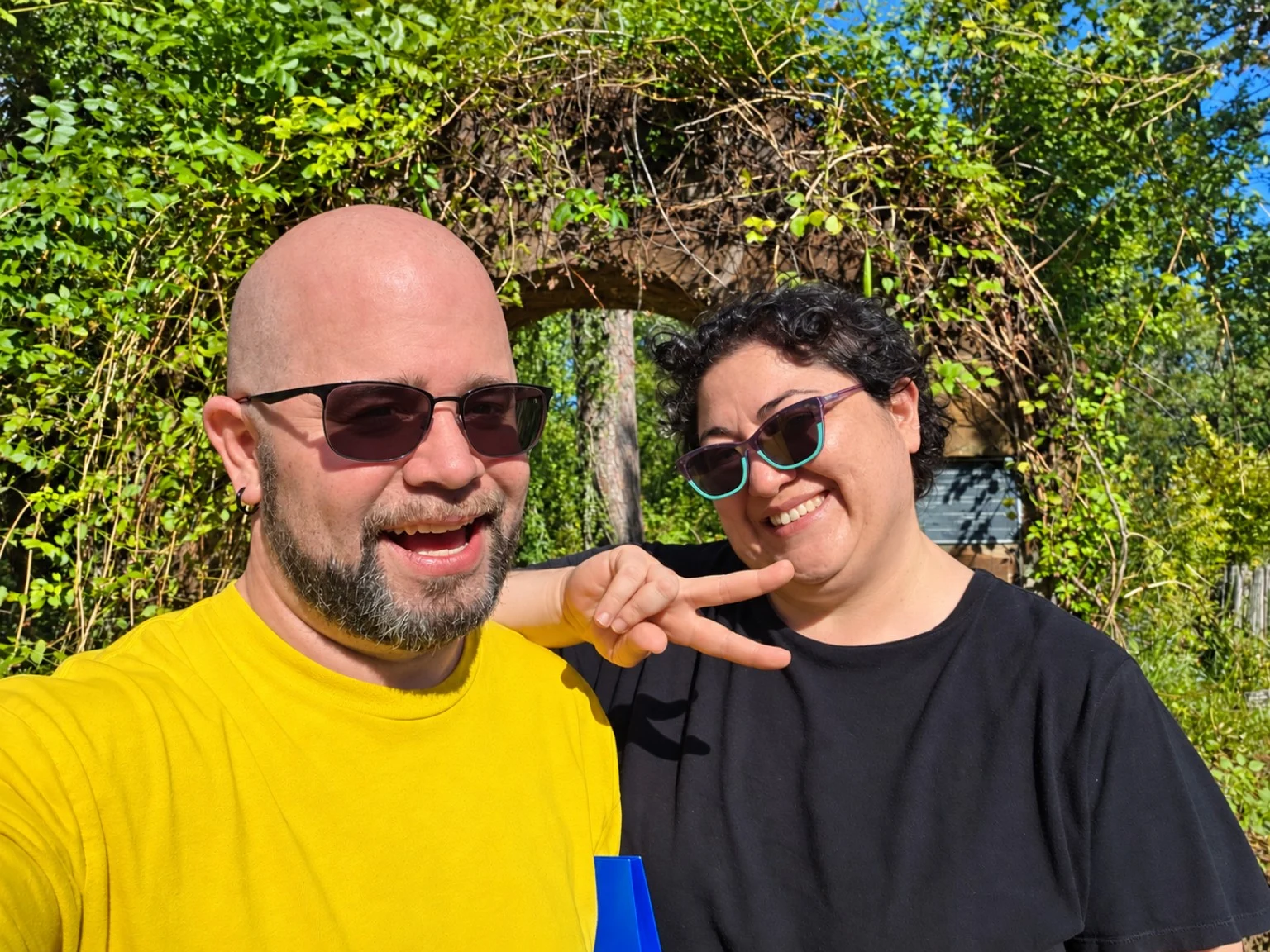 Efrain Ruiz and Kelly Trotman together in yellow and black shirts